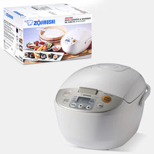 Zojirushi NL-AAC10-CA Beige Micom rice cooker with a hinged lid, front LCD control panel, side carrying handle and its NL-AAC10 carton.