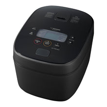 Zojirushi NW-QAC18 Black induction-heating rice cooker with a flat hinged lid and top LCD control panel.
