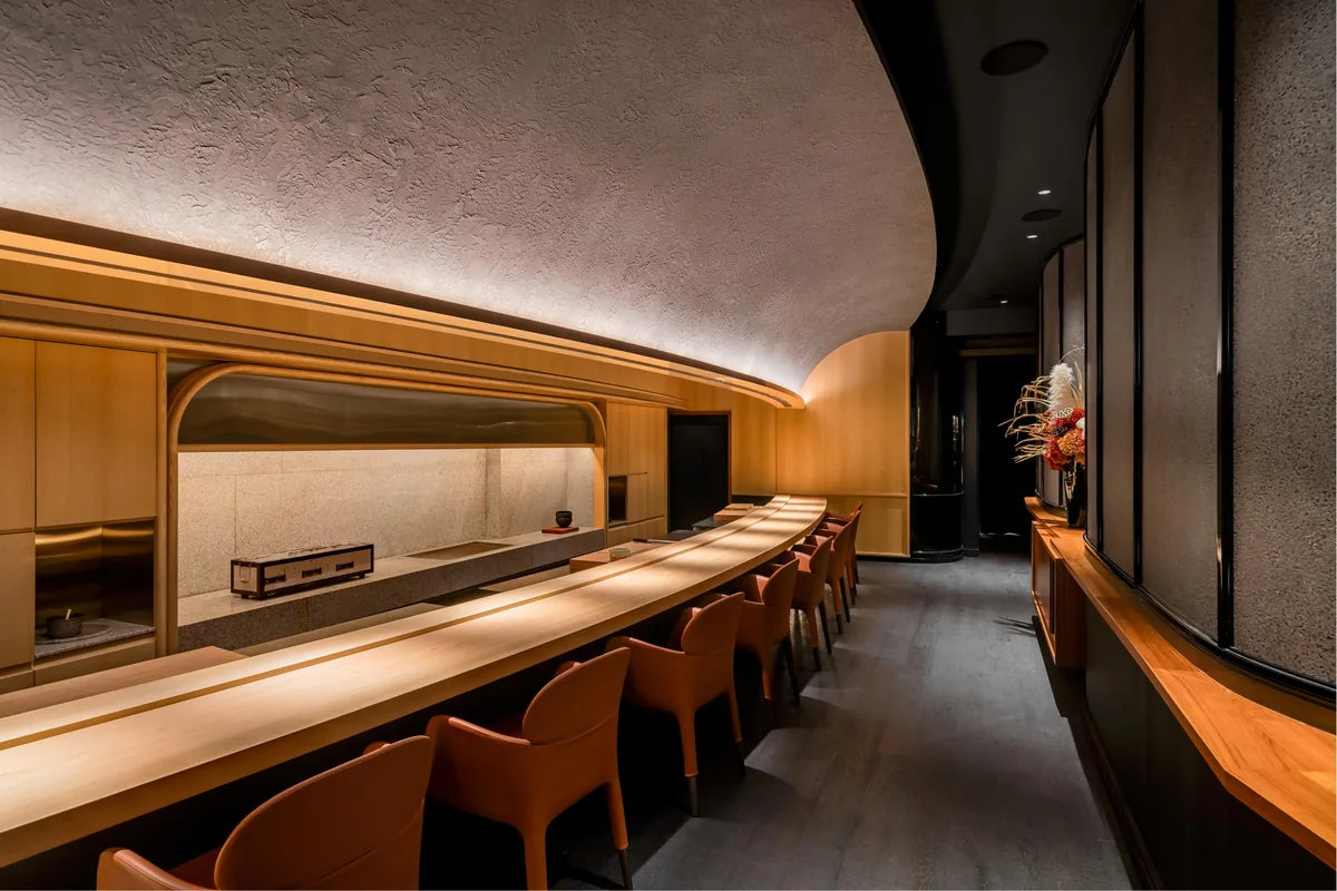 Chef-facing counter, guest chairs and separate work surface