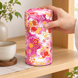 192HR0 pink floral washi tea canister being placed on a tea shelf