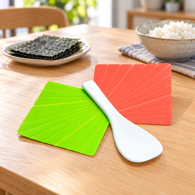Three-piece plastic hand-roll preparation set on a home dining table