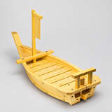 30-60-4B wooden sushi serving boat from the stern, showing the rail, slatted deck and wooden banner