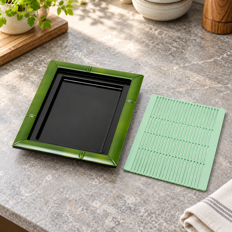 606-S-G green soba tray and removable plastic mat on a counter
