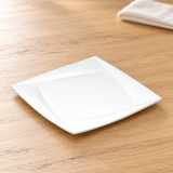 A005-173-03 white porcelain dish on a wood dining table