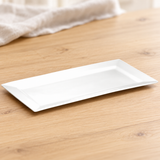 A239-01 white porcelain plate on a wood dining table