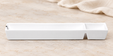 A5980 white divided rectangular dish in a neutral tabletop setting