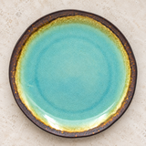 AS265-TQ ceramic plate in a neutral tabletop setting