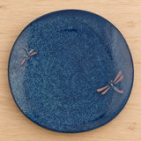 BD210-N blue dragonfly plate on a wooden tabletop, overhead view