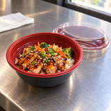 HD-700 red and black teriyaki bowl with prepared rice meal at a packing counter