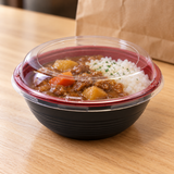HD-700 bowl with clear lid over a prepared meal at pickup