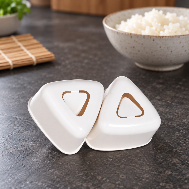 White 150285 two-piece triangular rice mold set on a preparation counter