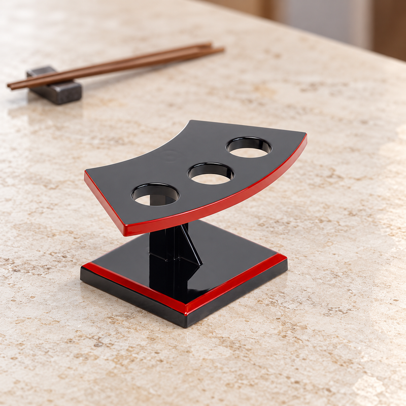 WO302 black and red three-slot handroll stand on a wooden table