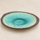 FDKG-1 green glazed plate in a neutral tabletop setting