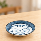 HB247-LMB blue lucky-cat dish on a wooden dining table