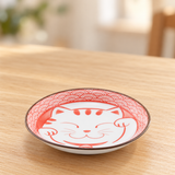 HB247-LMR red lucky-cat dish on a wooden dining table
