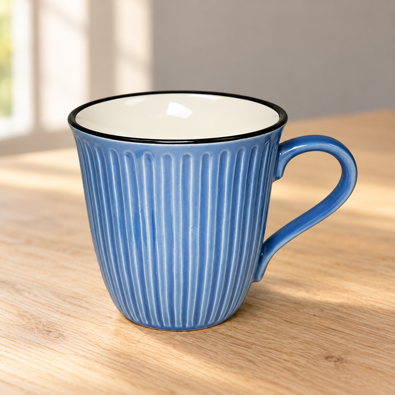 Blue K72 ceramic mug with vertical ribs, dark rim and light interior