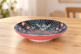 KN286-MA festival-design ceramic deep plate on a light wood table