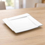 MW1-51-05 white square stepped-rim plate on a light wood table