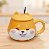 PC59-2 smiling dog mug with ear-shaped lid and spoon on a pale wood tabletop