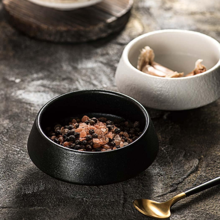 BK-3092 black bowl holding coarse seasonings in an original tabletop setting