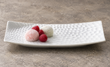A003-91-04 white textured rectangular plate with mochi and raspberries — serving example