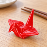 A11885-RD crane chopstick rest in a table setting