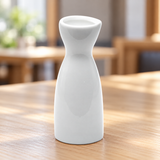 A1889 white ceramic sake bottle in a table setting