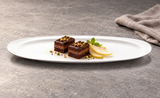 A18966 shallow white oval platter with two chocolate cake bites and pear slices