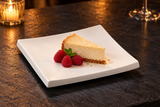 A2593 white square ceramic plate with cheesecake and raspberries.
