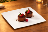 A2837 white flat square plate with two chocolate mousse desserts.
