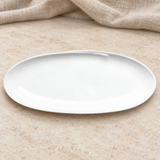 White oval plate on a tabletop