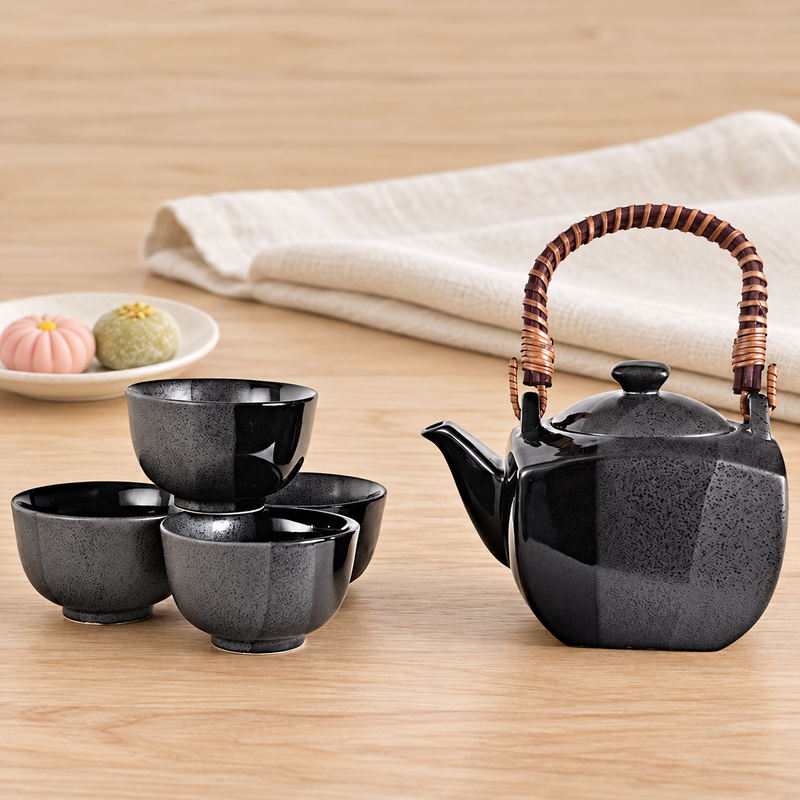 BD64-KI black and gray tea set on a table with separate sweets