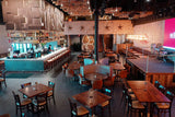 Natural black walnut butcher block tabletops in restaurant setting; bases and other furniture not included; dimensions vary by size