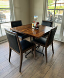 Natural black walnut butcher block tabletops in restaurant setting; bases and other furniture not included; dimensions vary by size
