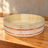 CK36 wooden sushi tub on a wooden counter, original wrapping retained
