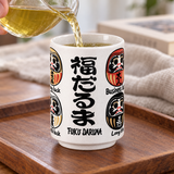 MN70-DRM Daruma teacup in a tea pouring setting; contextual accessories not included.