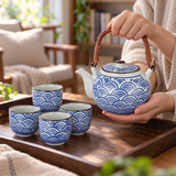 SH403 blue scallop tea set in a teapot handling setting; contextual accessories not included.