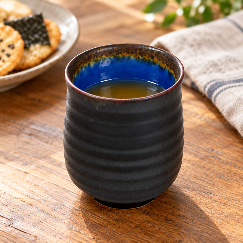 AS70-SP charcoal cup with vivid blue interior and ochre rim transition