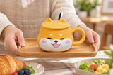PC59-2 tongue-out smiling dog mug with lid and spoon carried on a tray; tray and food not included.
