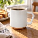 C008 white ceramic mug with coffee at breakfast
