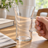 HARIO HGT-2T clear glass cup held by its handle; book, linen and other scene accessories are not included.
