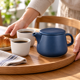 Navy coffee dripper pot on a tray with two cups of coffee; cups and other props not included.