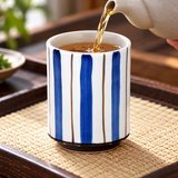 Tea being poured into the RT70-4 striped ceramic teacup