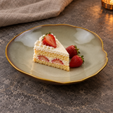 DJ-PL23-BR cream-and-brown deep round plate with strawberry shortcake on a stone tabletop