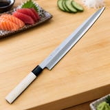 Tojiro - Shirogami Yanagi Knife 270mm (Left-Handed) in a kitchen preparation setting
