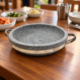 DH-STPD26 grey stone casserole pan on a dark dining tabletop