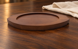 DH-WB22 wooden serving base on a dark dining tabletop; pan not included