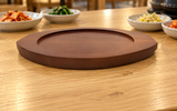 DH-WB24 wooden serving base on a light dining tabletop; pan not included
