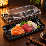 ED-30B black sushi container serving sashimi in a dining setting