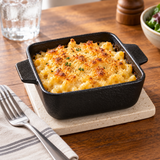 5″ Textured Black Ceramic Square Baking Dish — 12 oz with an individual baked pasta portion; table accessories shown separately